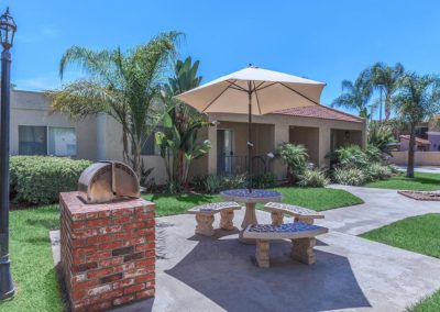 courtyard with barbeque at evergreen villas