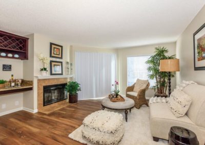 living area with fireplace at arezzo apartments