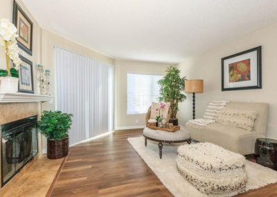 living area with fireplace at arezzo apartments