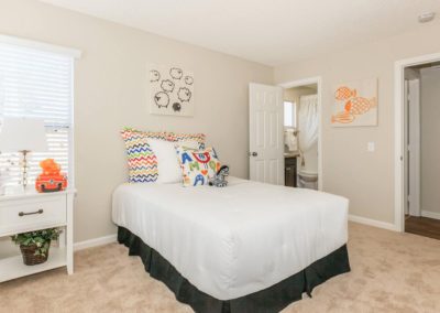 bedroom with bathroom at arezzo apartments