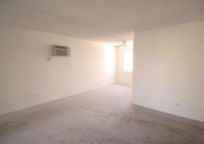 living area at arizona towers with carpet