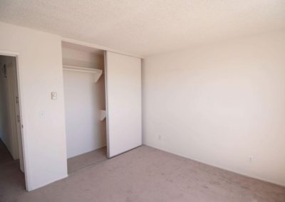 bedroom with closet at arizona towers