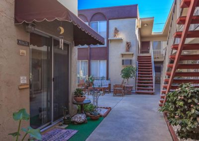 courtyard entryway and landscape at arizona towers