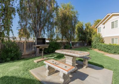 citrus court seating area with barbeque