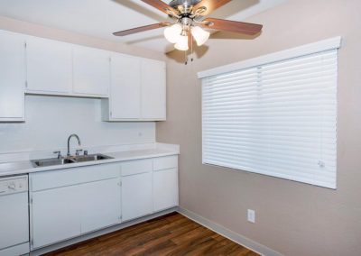 kitchen with ceiling fan and sink at euclid oaks