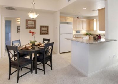 kitchen area with table and chairs