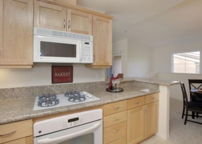 kitchen with stove and microwave