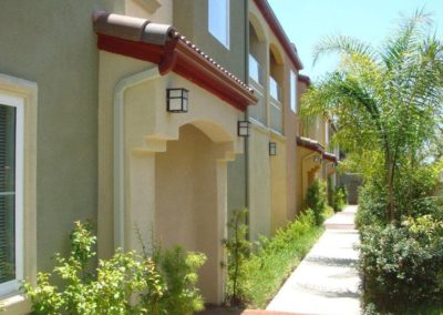 pathway with greenery and front porch