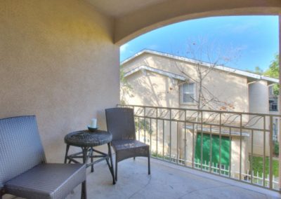 balcony with chairs and table