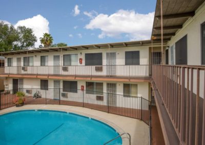 second floor balcony and pool overview at la mesa palms