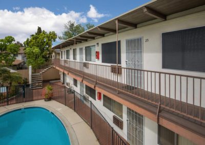 overview of pool area and second floor balcony