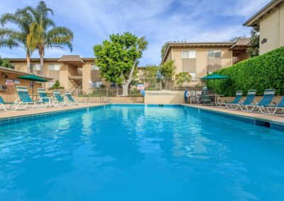 gated pool deck area with lounges at la mesa spring gardens