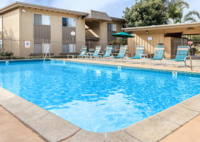 gated pool deck area with lounges at la mesa spring gardens