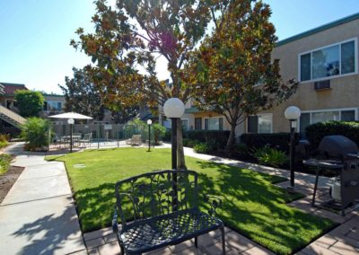 landmark gardens outdoor space with barbeque and grass