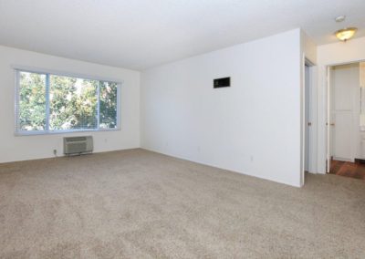 landmark gardens living area with window and heater