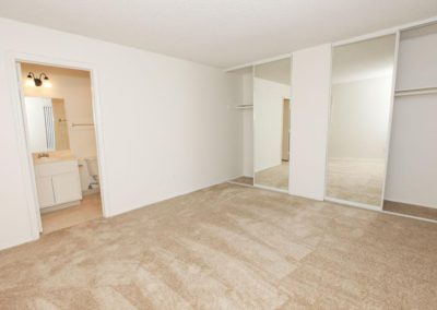 bedroom with closet and bathroom at lemon gardens