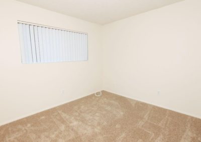 carpeted bedroom at lemon gardens