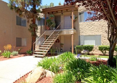 front porch and stairway to upstairs unit at lemon gardens