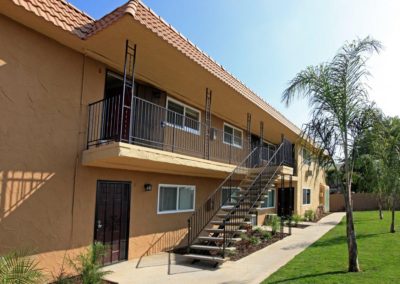 exterior and stairway to second floor at maple view apartments