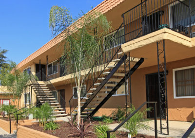 exterior patio and stairway to second floor at maple view