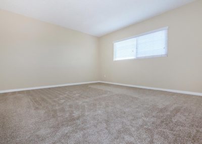 bedroom with carpet at fresno terrace