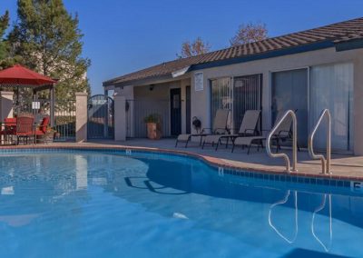 pool deck at the pines apartments