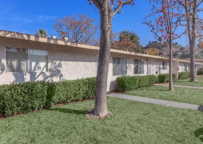 exterior of pinewood villas with grass