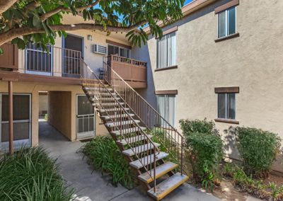 stairs to second floor units and landscape at portofino apartments