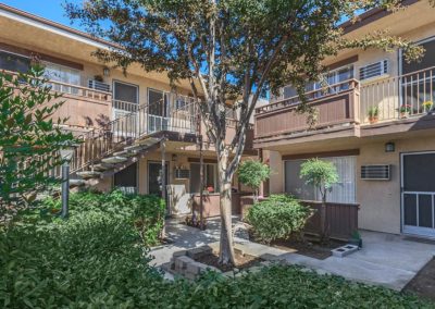 courtyard area with landscape at portofino apartments