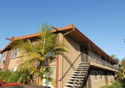 exterior and stairway to second floor units at ni si apartments