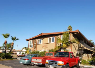 exterior and parking lot at ni si apartments