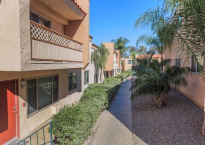 parklane aprtments exterior walkway with landscape