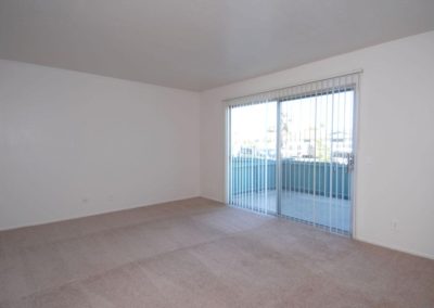 living area with sliding door at paseo del prado