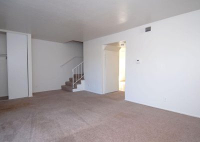 living area and closet at paseo del prado