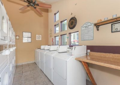 laundry room at peppertree gardens apartments