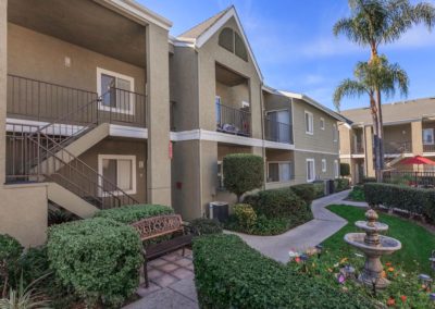 pathway and exterior of peppertree gardens apartments