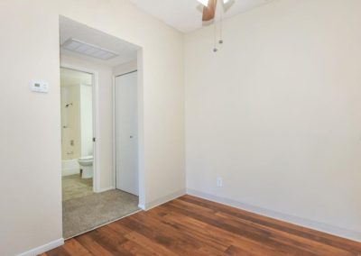 living area with bathroom at peppertree gardens apartments