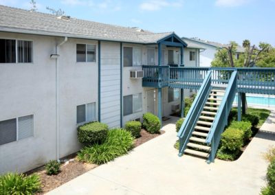 stairway to second floor units and landscaping at raymond ritz