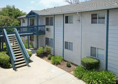 exterior of raymond ritz and stairway to second floor