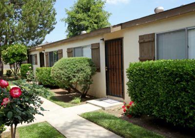 exterior of rosewood villas with landscape