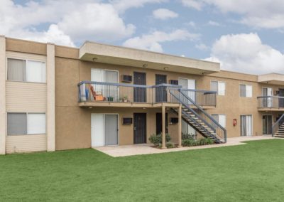 grass area and exterior at sandalwood apartments