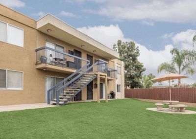 exterior and grass area at sandalwood apartments