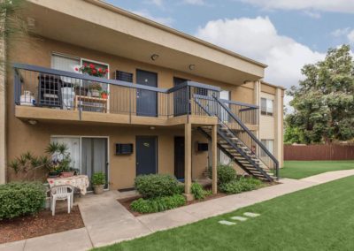 exterior of sandalwood apartments and grass area