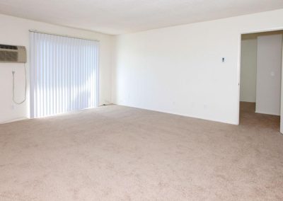 living area and sliding glass door at sandalwood apartments