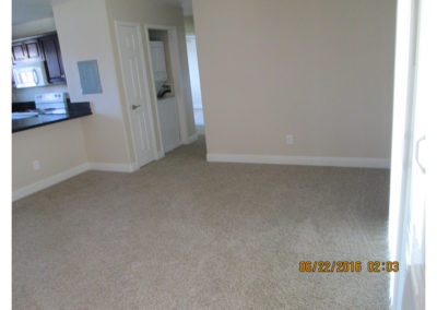 living area with kitchen at taft manor