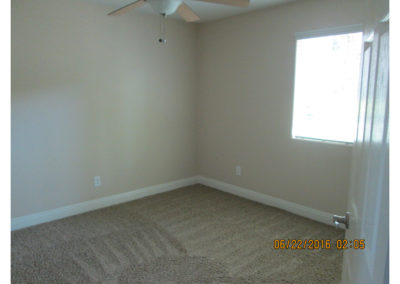 carpeted bedroom at taft manor