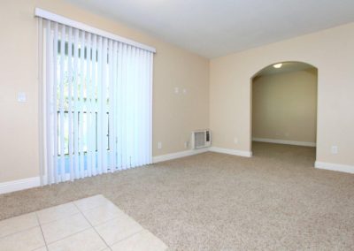 living area with sliding glass door at taft manor