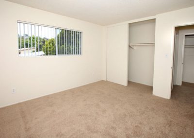 bedroom with closet and bathroom at parks ave