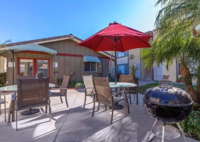 lounge area and barbeque at westwood apartments