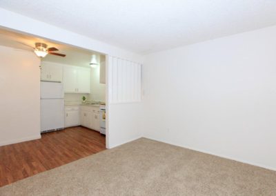 living area with kitchen at town and country gardens